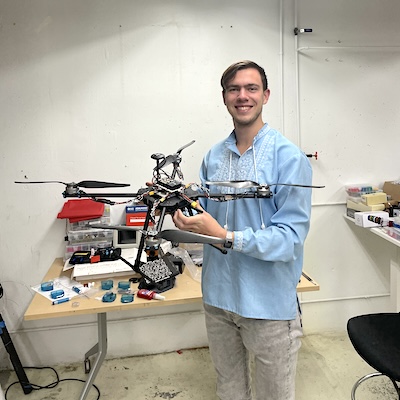 Ivan Dudiak ’26 and a drone technology prototype. 