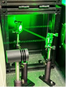 Green laser lights REMPI